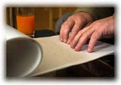 Hands reading braille
